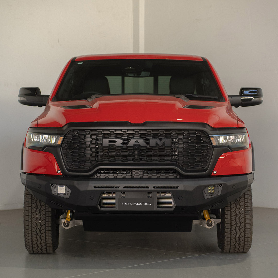 Red Ram truck front view in a studio setting