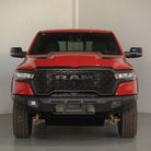 Red Ram truck front view in a studio setting